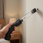 Using a mosquito catching tube in a bedroom to remove insects safely without harmful chemicals.